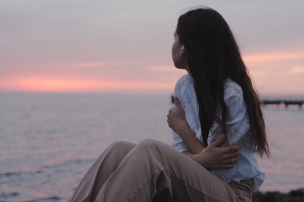 EMDR Image of young girl looking at the sea and thinking